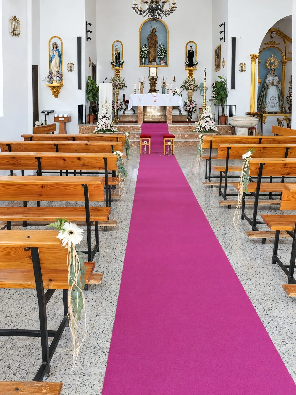 Fuchsia aisle runner in a church
