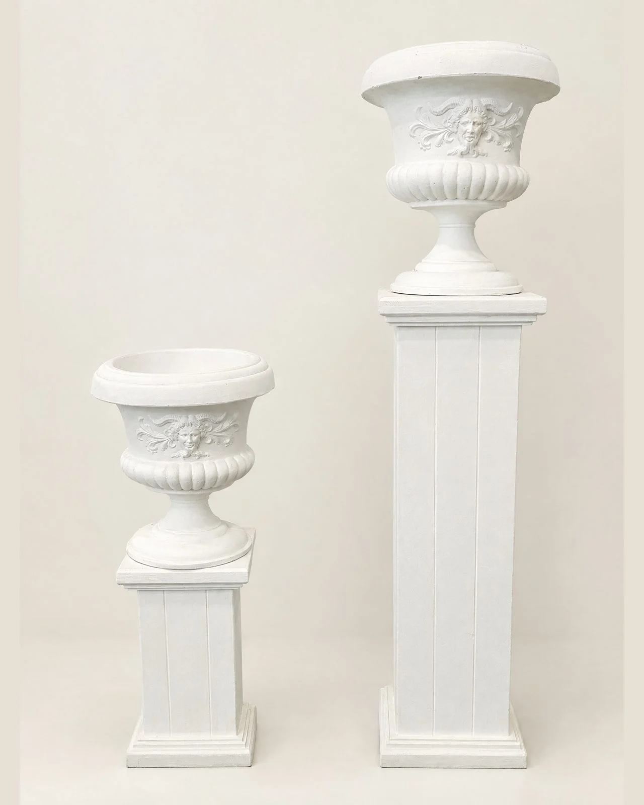 White columns and urns