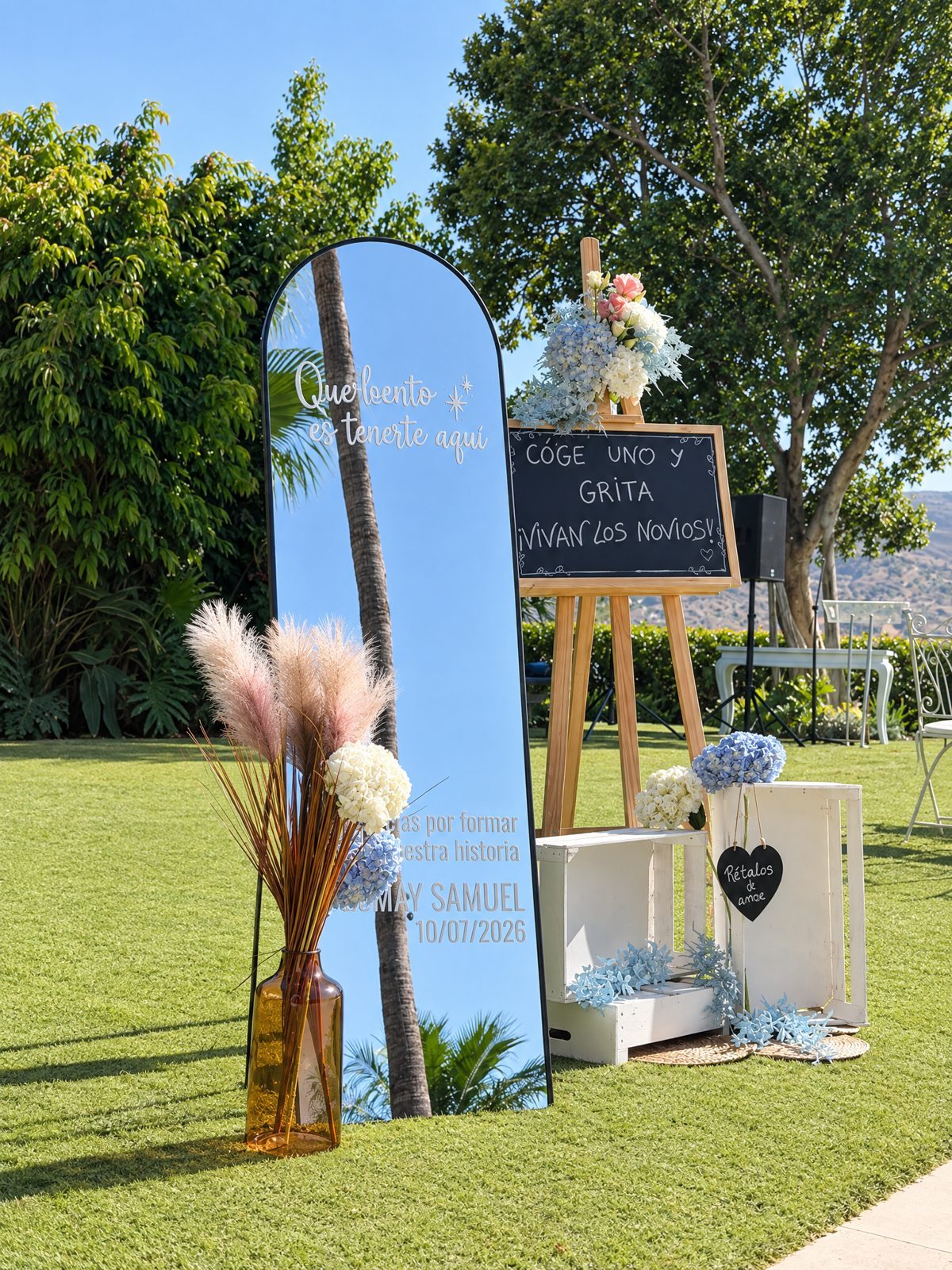 Arched welcome mirror with pampas grass and a chalkboard on an easel